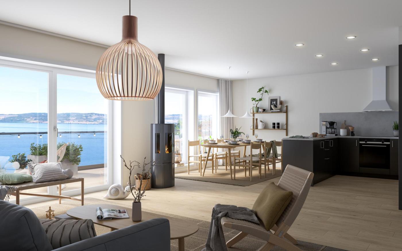 Lys og moderne stue med flott utsikt over Mjøsa