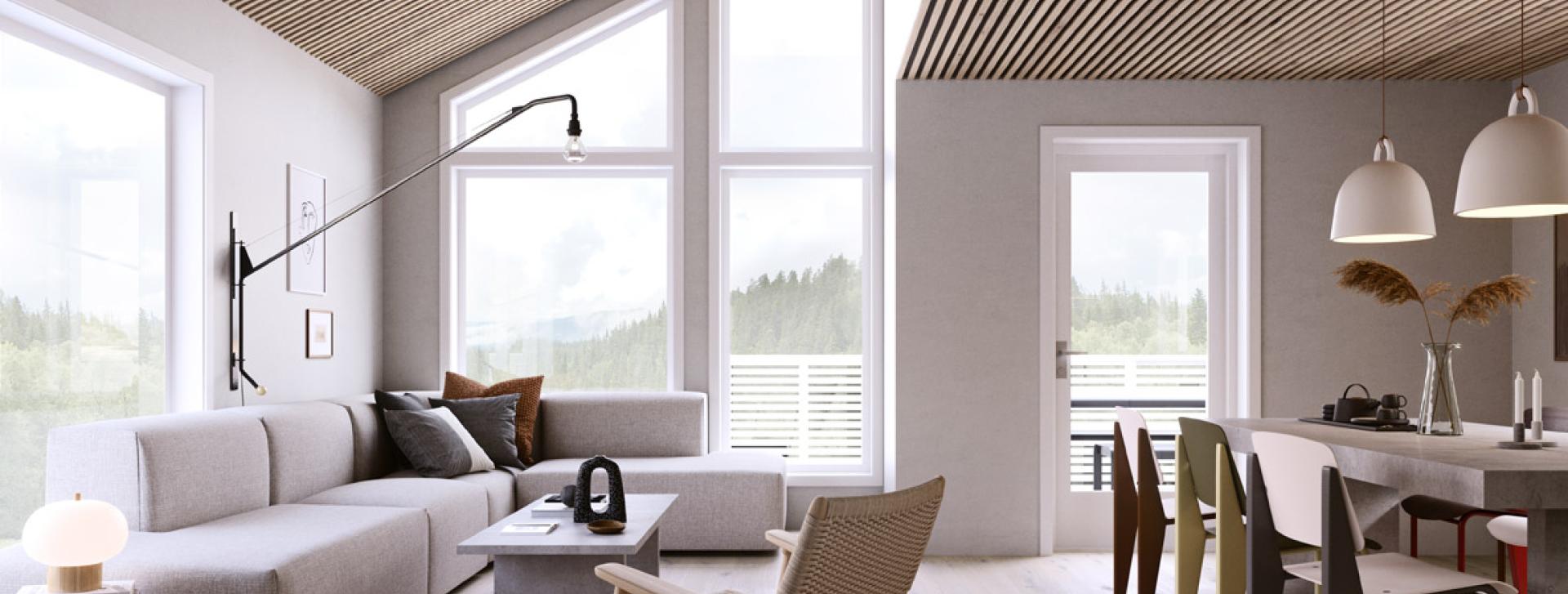 Lys og åpen stue- og kjøkkenløsning i moderne hus fra Nordbohus