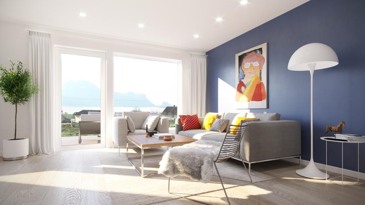 Flott stue med parkett, blå vegg og store vinduer med flott utsikt